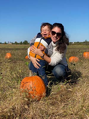 Natalia Rodriguez and her son, Bruno, at a pumpkin patch