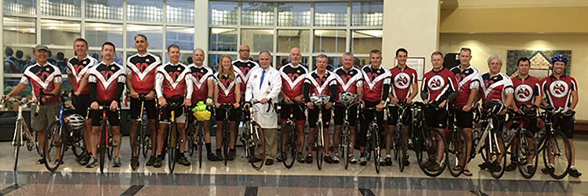 Group photo of 2014 ride participants and volunteers